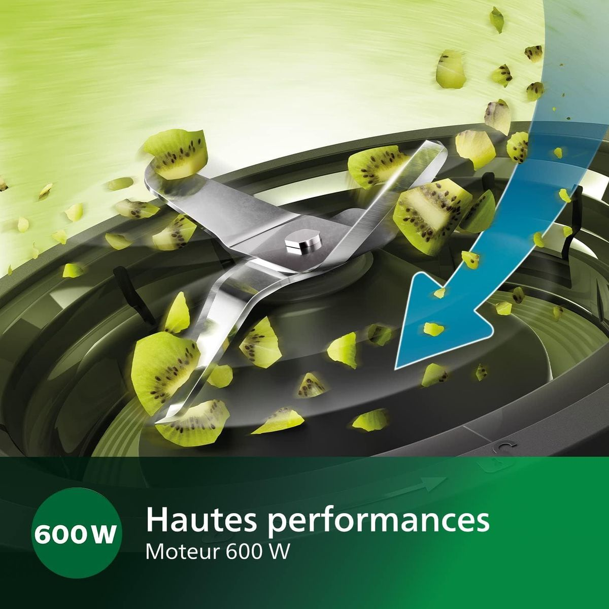 Blender kroi kiwi. Srebrne ostrza kroją owoce, kawałki latają. Niebieska strzałka wskazuje wysoką wydajność.