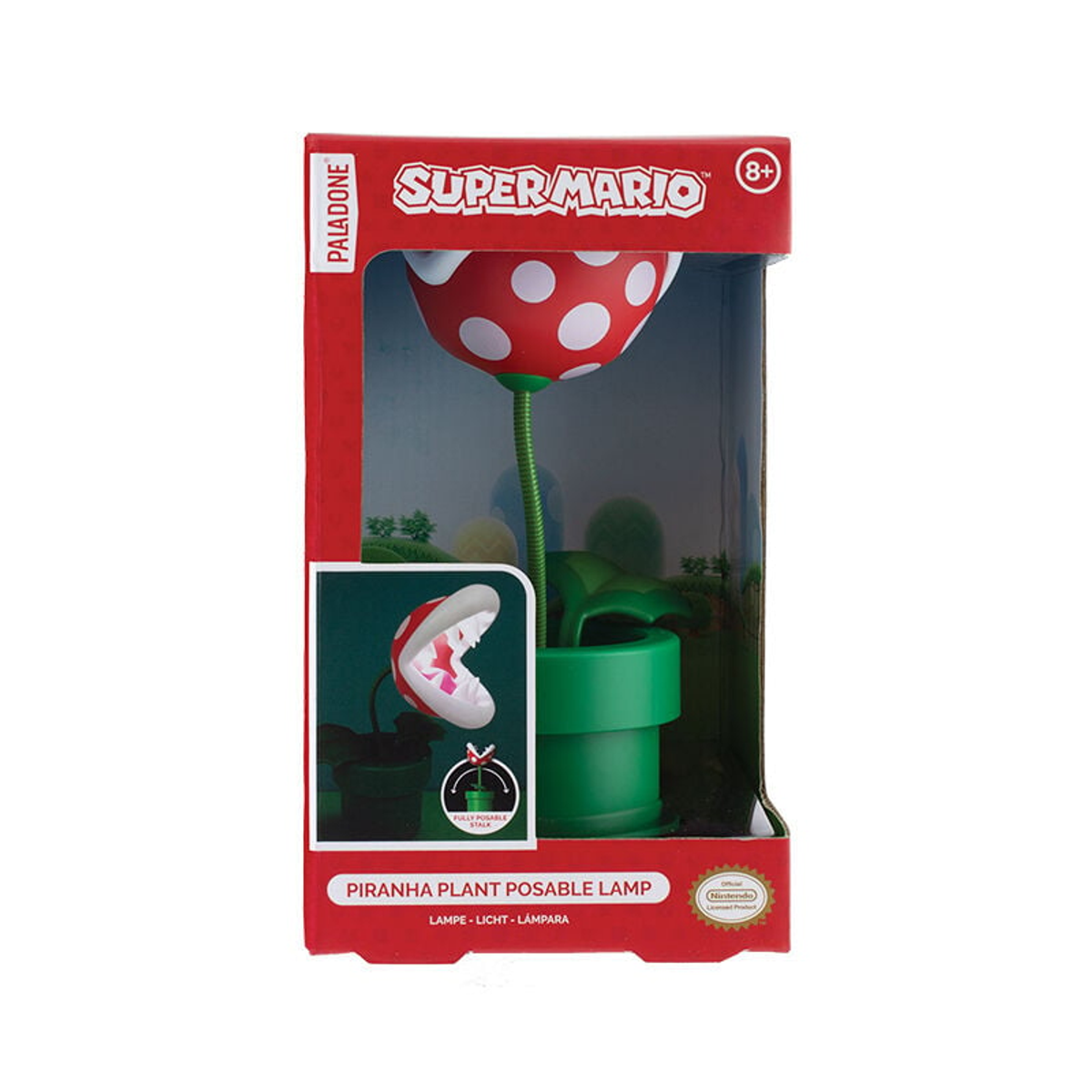 Lampa Super Mario Piranha Plant w pudełku. Czerwono-biała głowa w kropki, zielona łodyga i doniczka, w czerwonym pudełku z tekstem.
