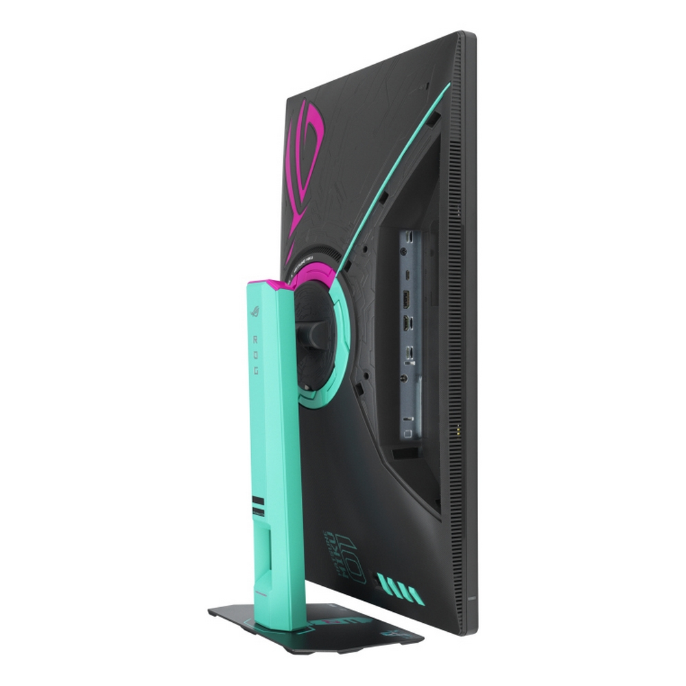 A side view of a gaming monitor. It's black with teal and pink accents. The stand is teal. Ports are visible on the side.