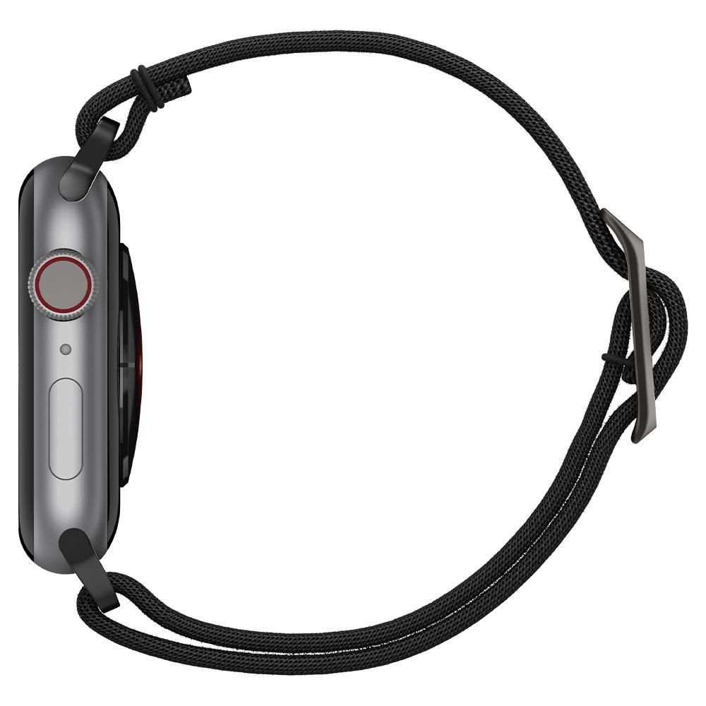 A side view of a smartwatch with a black strap, featuring a circular button and a rectangular button on the side.