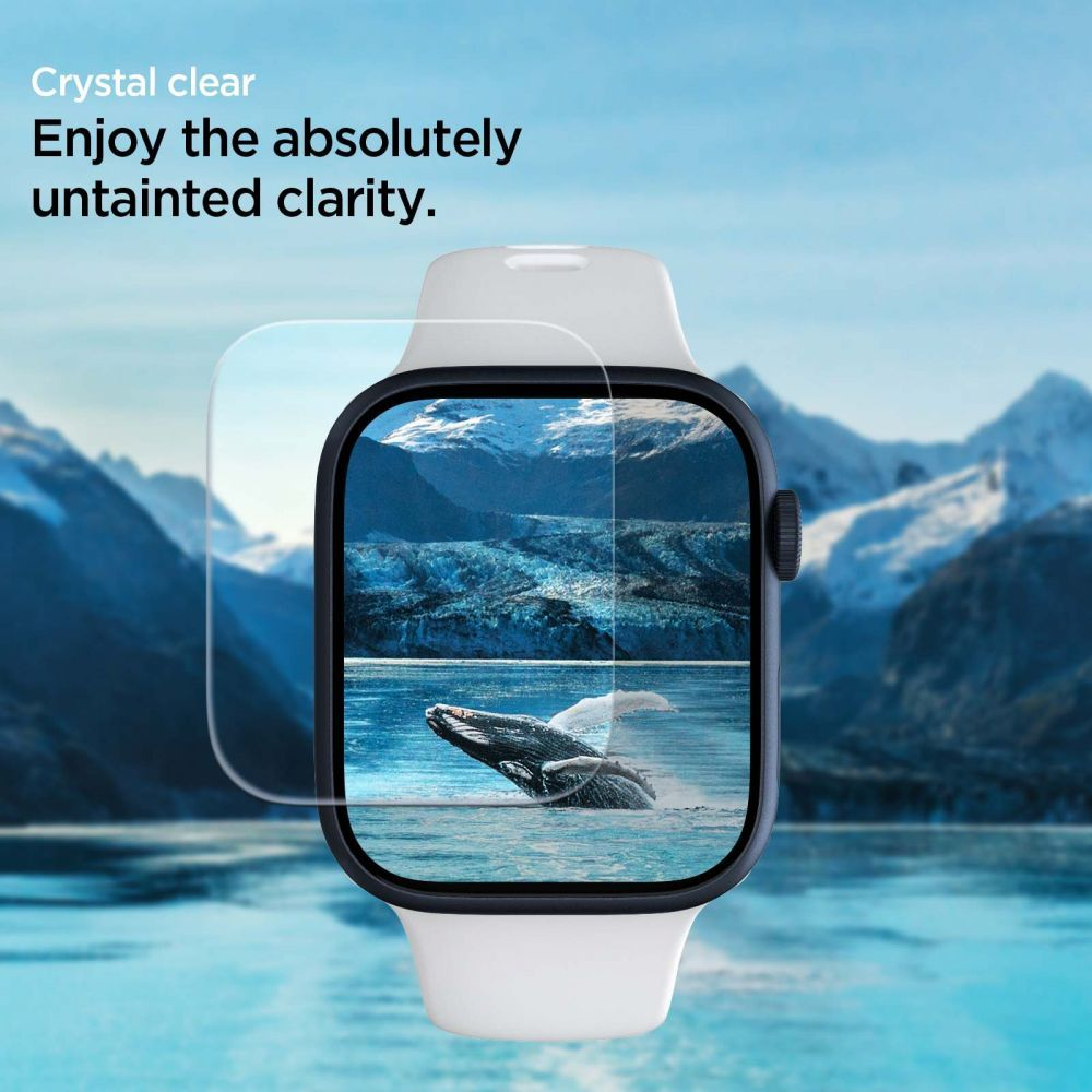 A smartwatch displays a whale breaching in the ocean with mountains in the background. It emphasizes screen clarity.