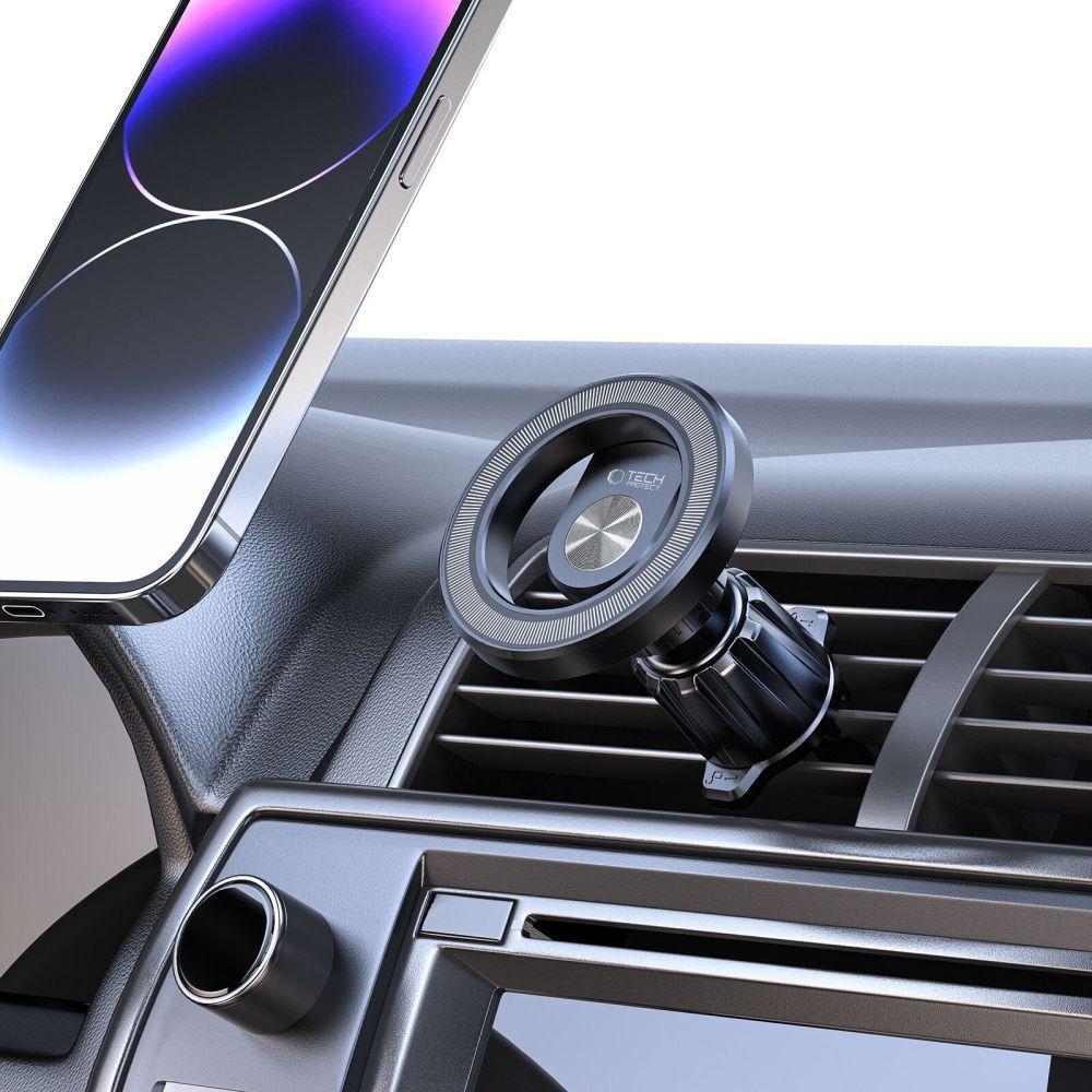 Un telefono è tenuto da un supporto per telefono per bocchetta dell'auto. Il supporto è nero e argento. Il telefono ha un bordo nero e un retro bianco.