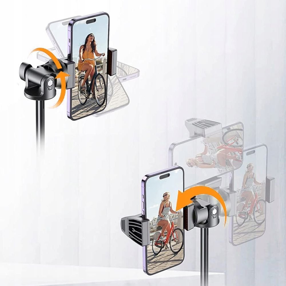 Een telefoonhouder met een telefoon waarop een vrouw op een fiets staat. De houder draait, aangegeven met oranje pijlen.