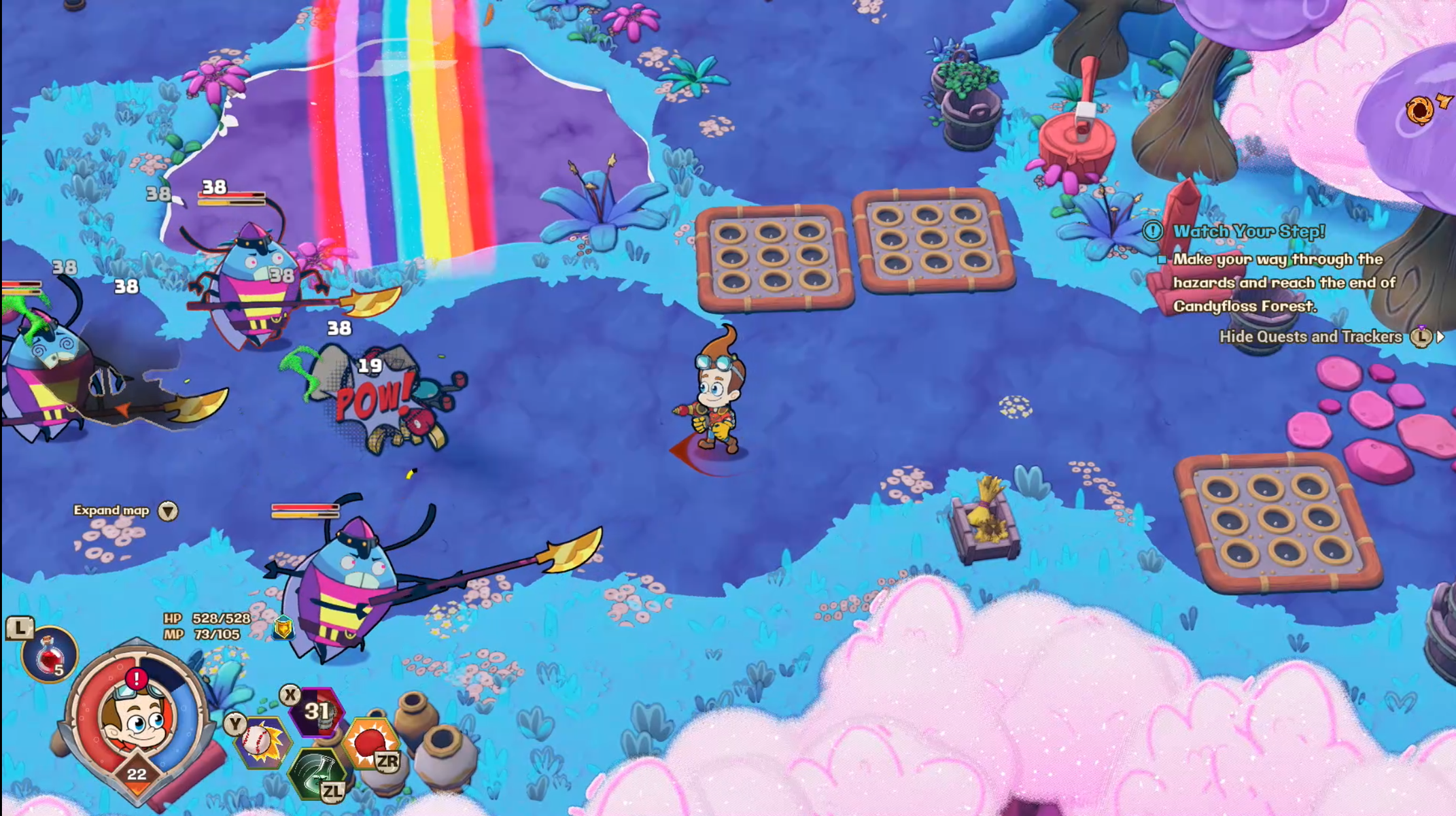 Scena z gry z postacią, wrogami, tęczą i przeszkodami. Postać jest na środku, zwrócona przodem.