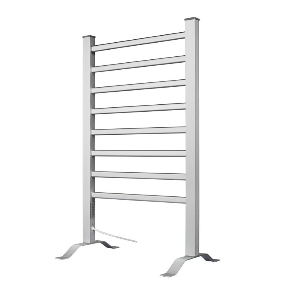 Srebrny, wolnostojący grzejnik do ręczników. Ma poziome pręty i prostokątną ramę.