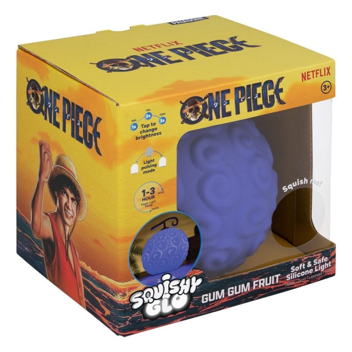 Une boîte 'One Piece' avec une lumière de fruit bleue à l'intérieur. La boîte a un personnage de dessin animé et le logo Netflix.