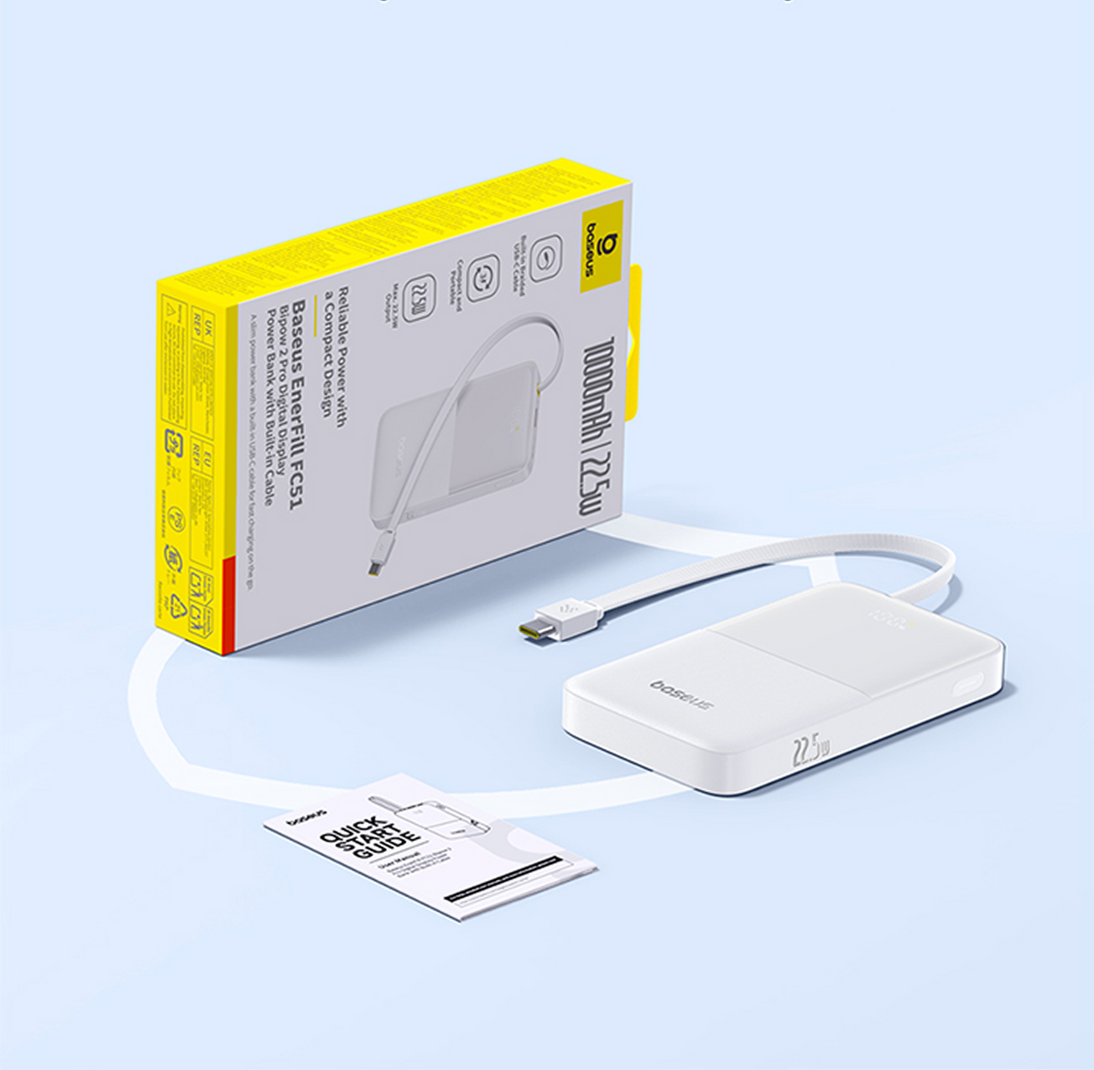 Power bank Baseus bianco con cavo integrato, scatola e guida rapida su superficie blu. La scatola è gialla e bianca.