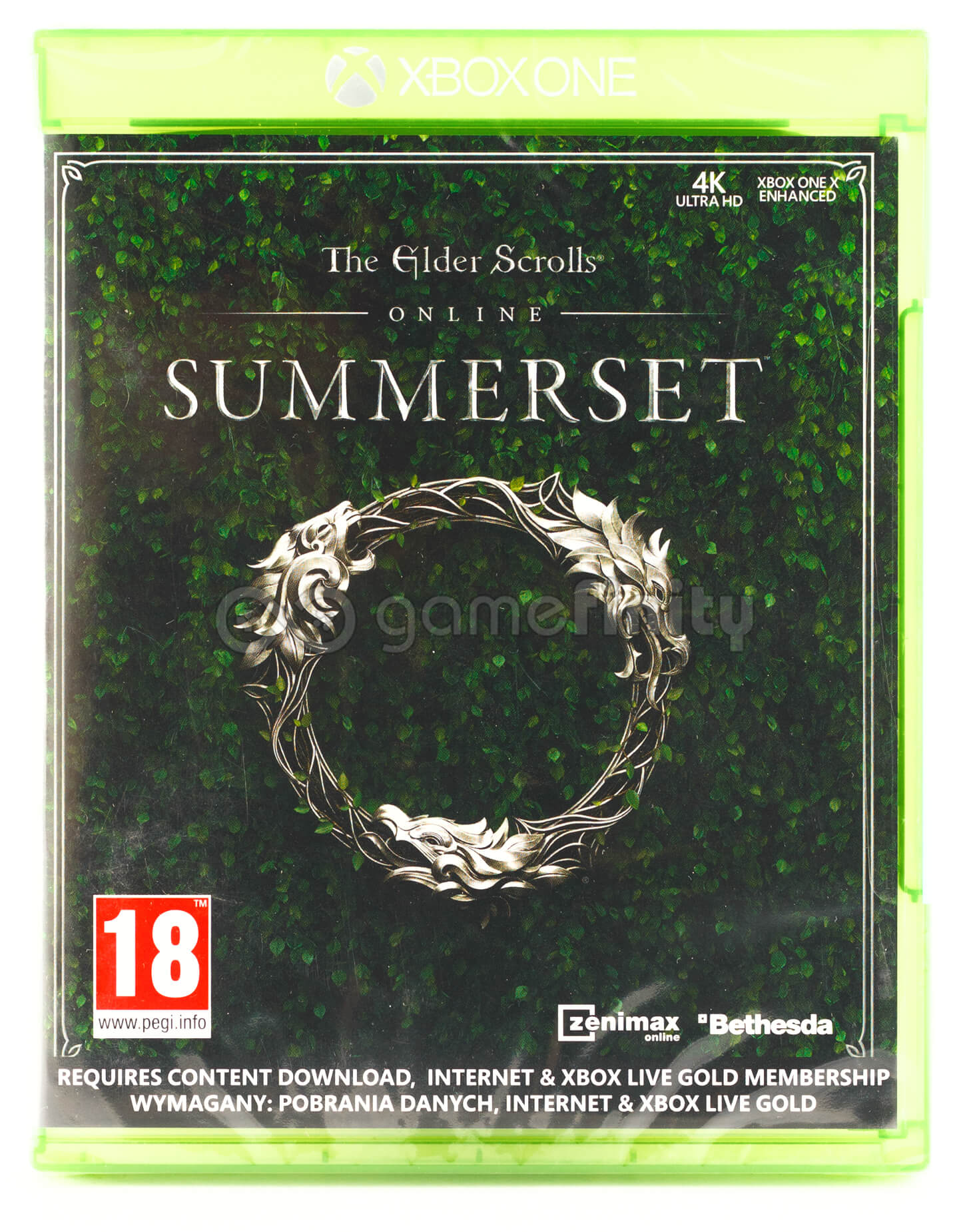 Pudełko z grą The Elder Scrolls Online: Summerset. Zielone liście w tle. Srebrny wieniec. Etykieta Xbox One, kategoria wiekowa 18.