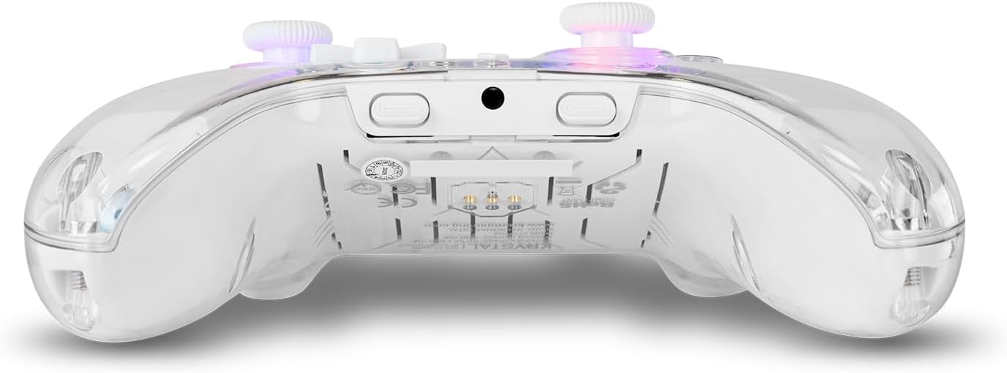Un mando de juego transparente y claro. Tiene dos joysticks y botones. El mando tiene un diseño blanco y transparente.