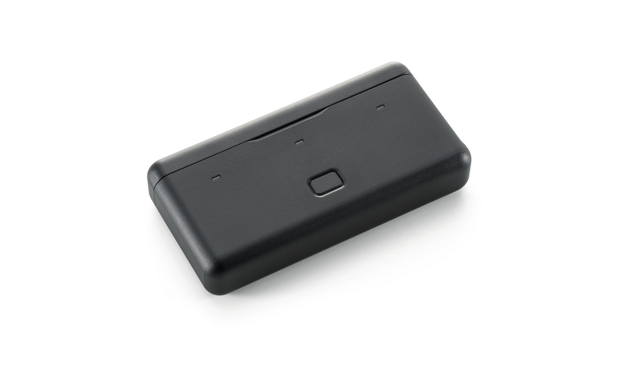Un appareil noir rectangulaire aux bords arrondis et un bouton. Il est sur fond blanc.
