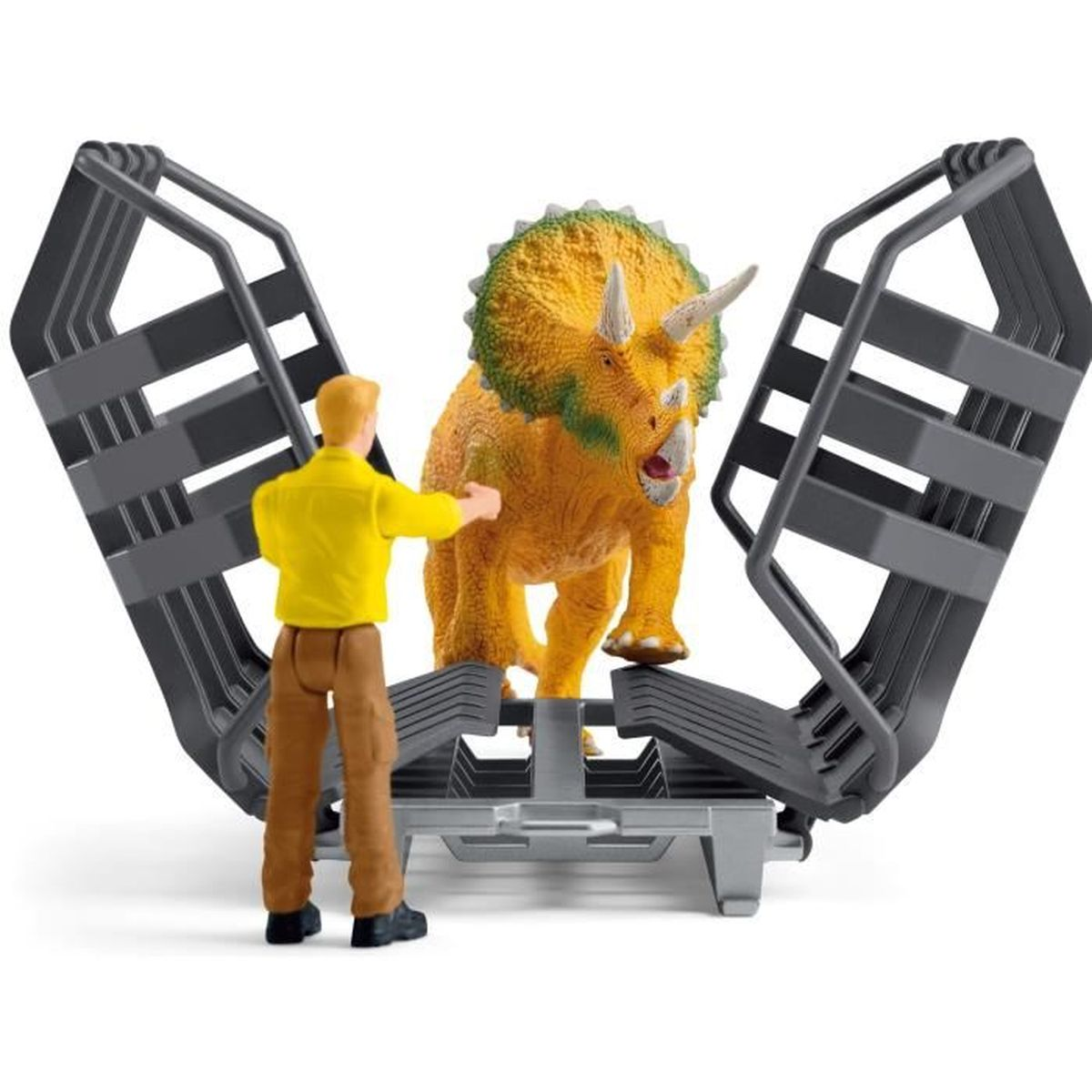 A toy scene shows a triceratops in a cage with a person. The dinosaur is yellow and green, the cage is gray, and the person wears yellow.