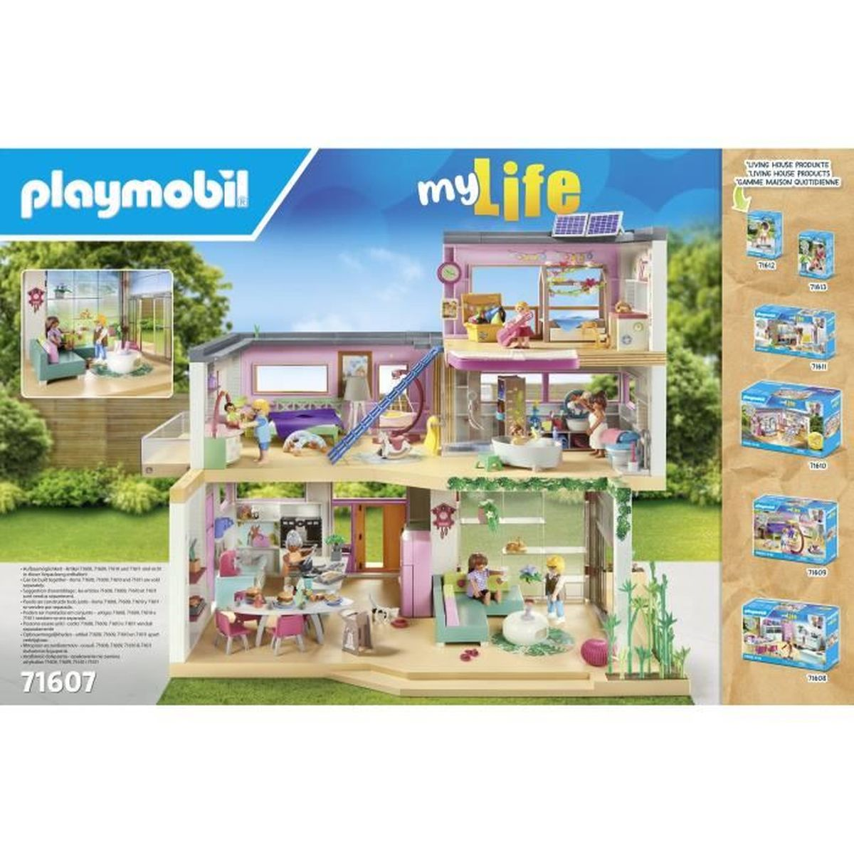 Playmobil My Life Puppenhaus. Mehrere Zimmer mit Möbeln und Figuren sind sichtbar. Kartons anderer Sets sind ebenfalls abgebildet.