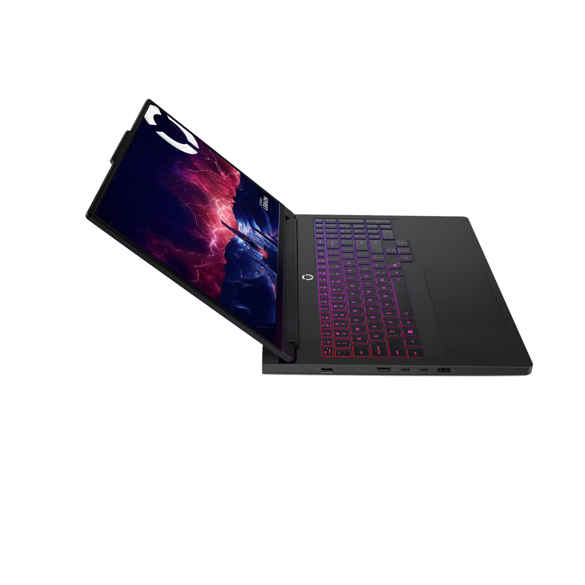 Un portátil negro con teclado colorido, abierto sobre una superficie negra. La pantalla muestra un gráfico púrpura y rojo.