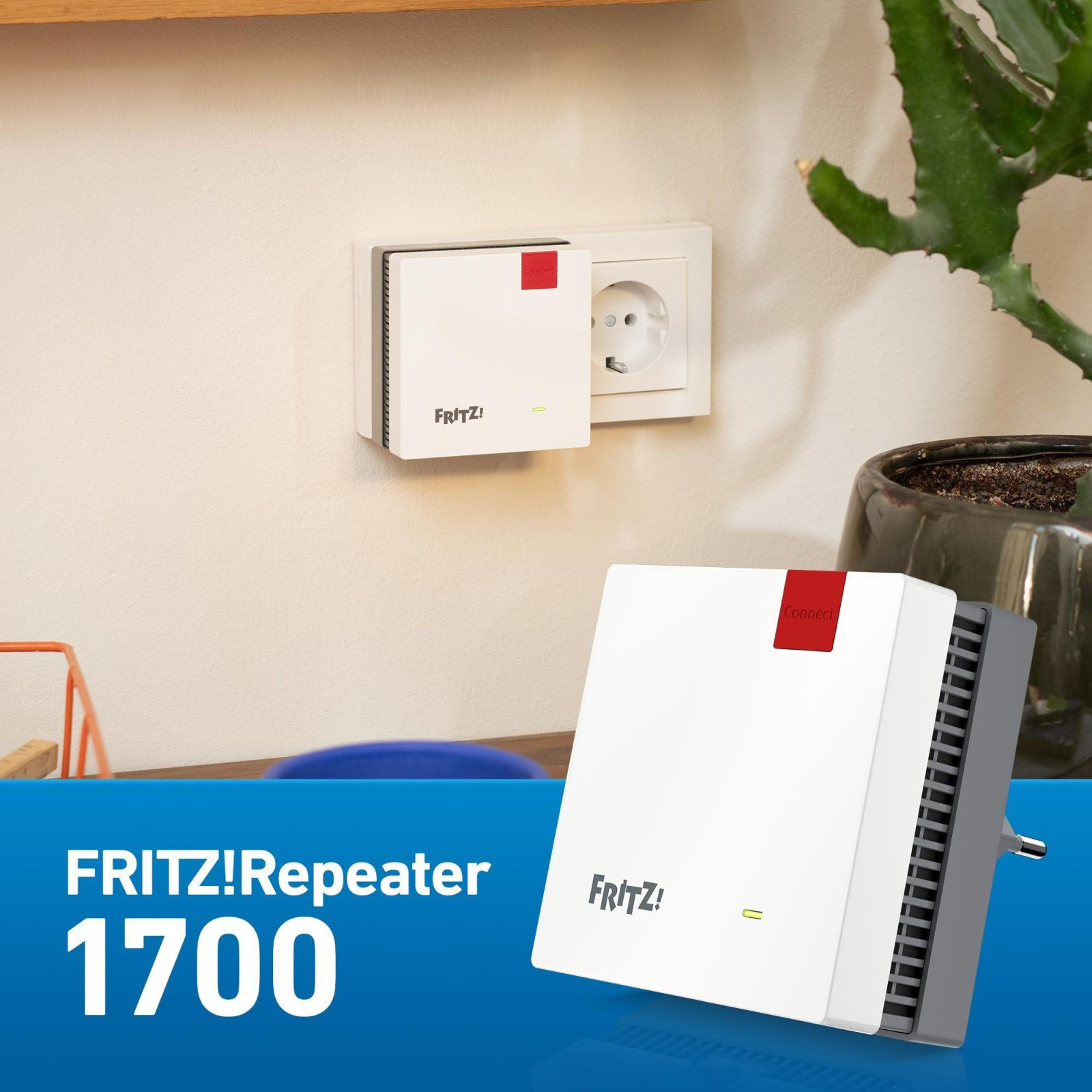 Un Fritz!Repeater 1700 bianco, collegato a una presa a muro, con un cactus verde sullo sfondo. Il dispositivo ha un quadrato rosso.