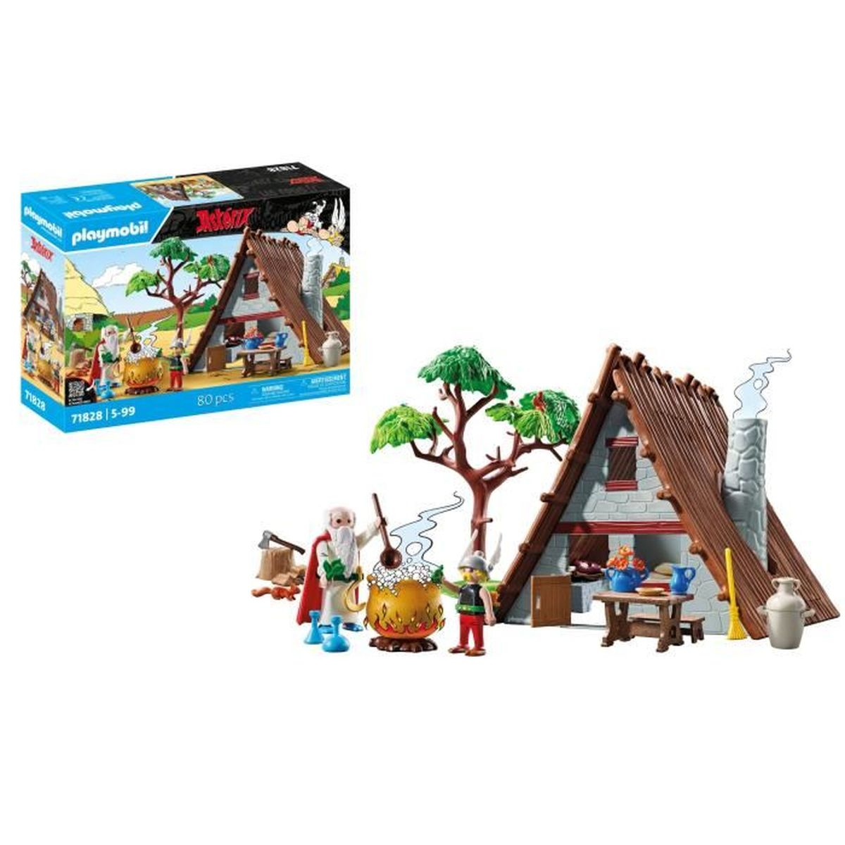 Set Playmobil con scena del villaggio, personaggi e una casa. La scatola è a sinistra. Personaggi riuniti attorno a un pentolone.