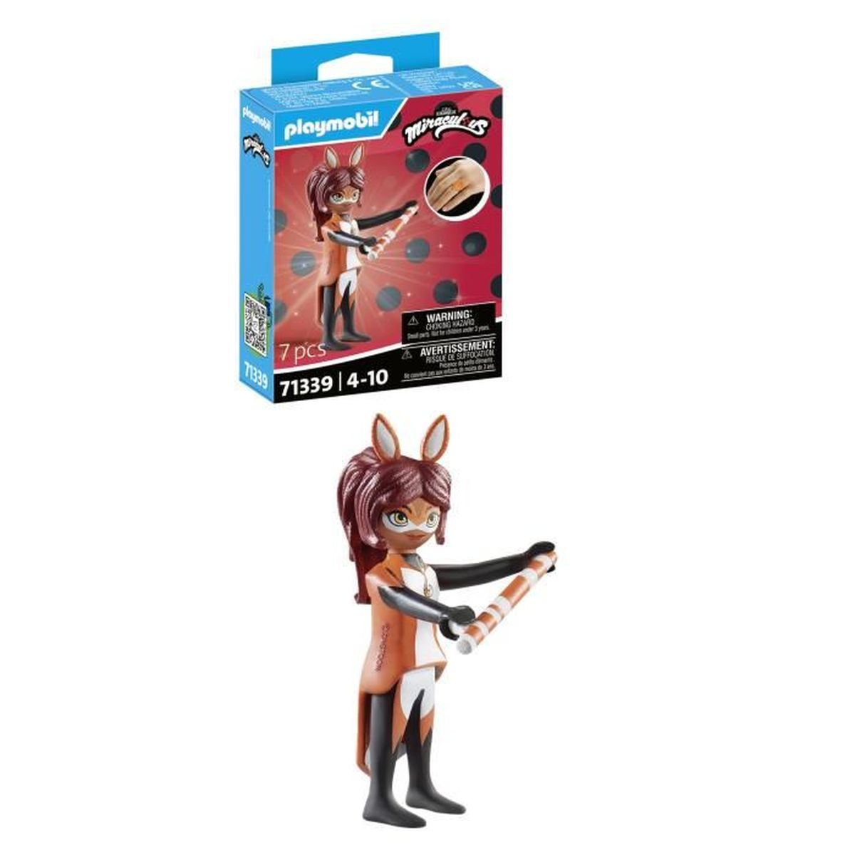 Una figura Playmobil di una ragazza con orecchie da volpe, che tiene in mano un bastone. Una scatola del giocattolo è sullo sfondo.