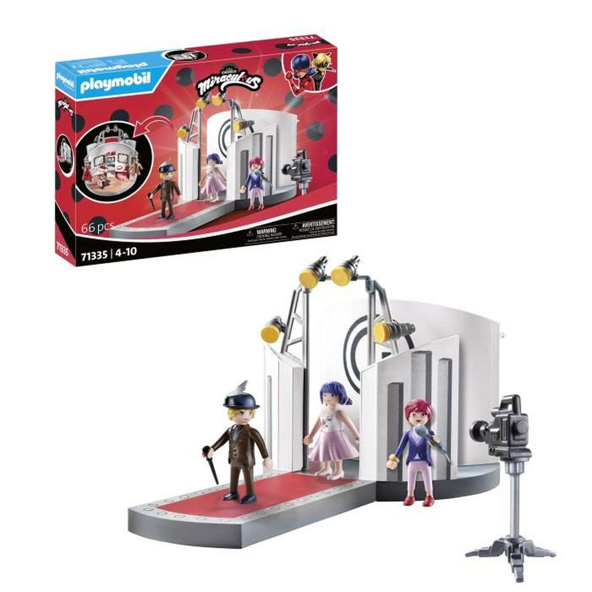 Set Playmobil: palco Miraculous con personaggi e telecamera. Il palco ha luci e tappeto rosso. La scatola è sullo sfondo.