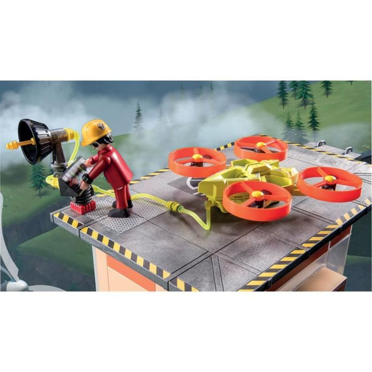 A toy figure in red suit and yellow helmet adjusts a machine next to a drone with orange propellers on a platform.