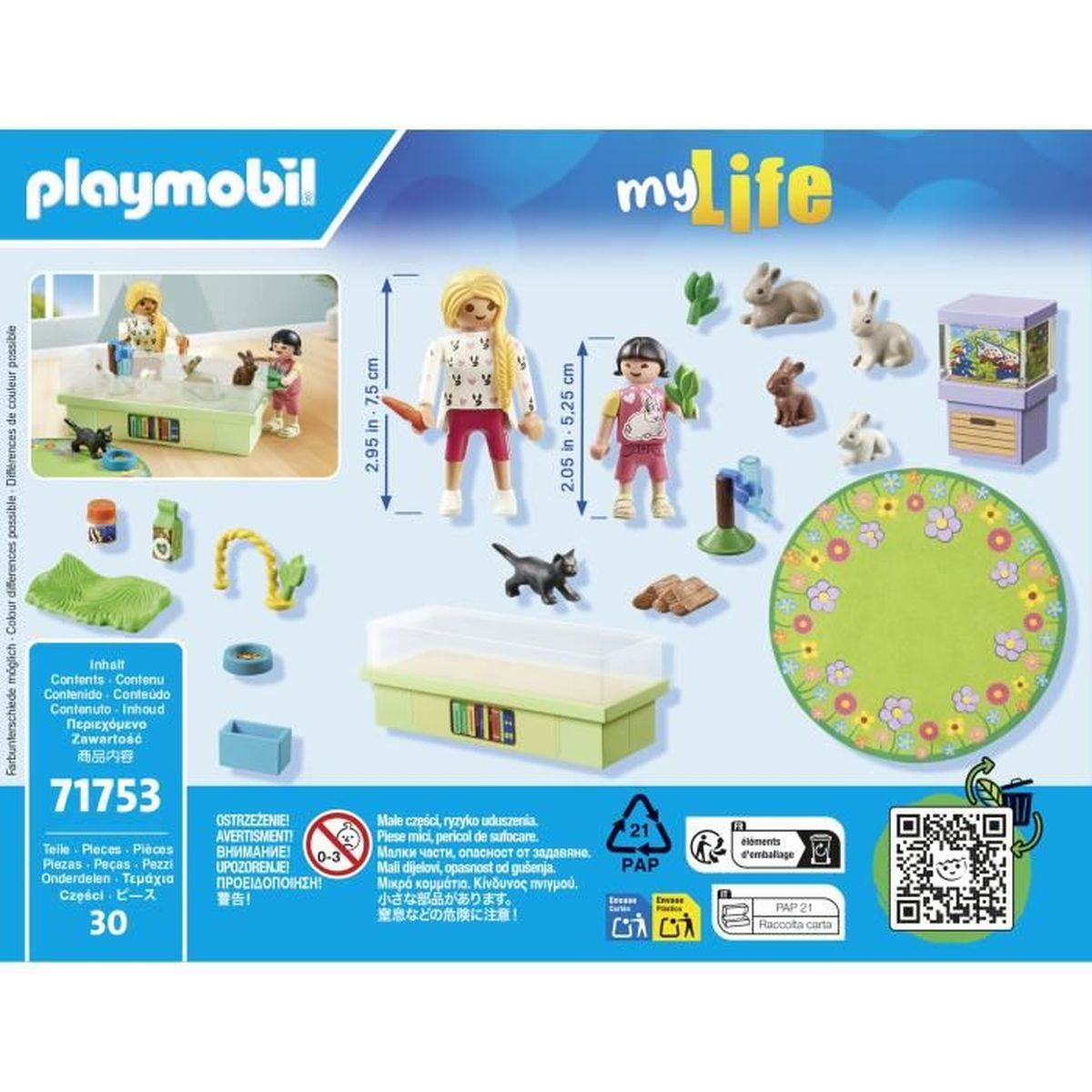 Zestaw Playmobil My Life. Zawiera figurki, króliki, kota i akcesoria, ułożone na zielono-białym tle.