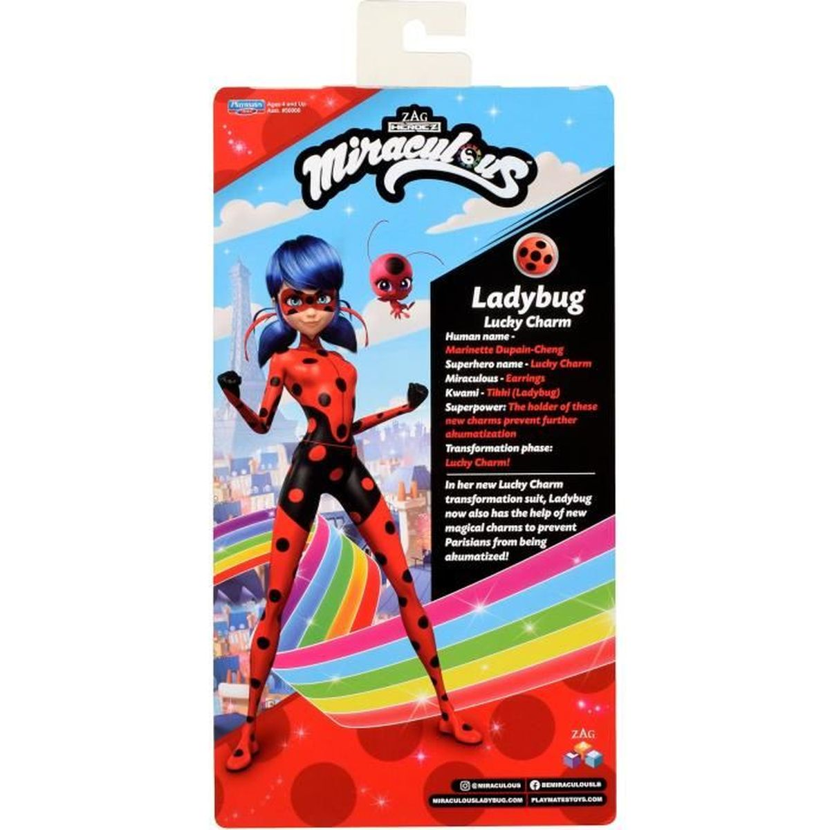 Ladybug-Spielzeugverpackung. Ladybug-Figur in einem Anzug steht auf einem Regenbogen, Hintergrund zeigt Paris und ein rot-schwarzes Design.