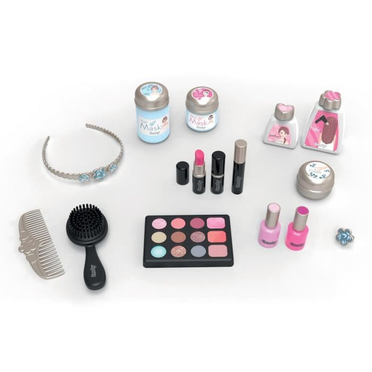 Eine Sammlung von Spielzeug-Make-up und Accessoires, darunter Lidschatten, Lippenstift, Nagellack, Haarbürste und ein Diadem.