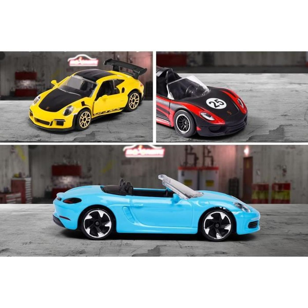Drei Spielzeugautos: gelb mit schwarzem Dach, rot und schwarz und blaues Cabrio. Alle stehen auf grauem Untergrund.
