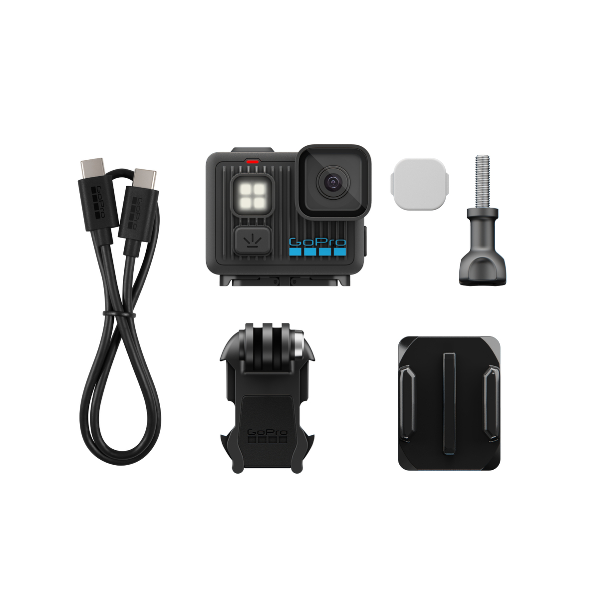 Czarna kamera GoPro z akcesoriami, w tym kablem USB, mocowaniem, śrubą i białą zaślepką, wszystko na białym tle.