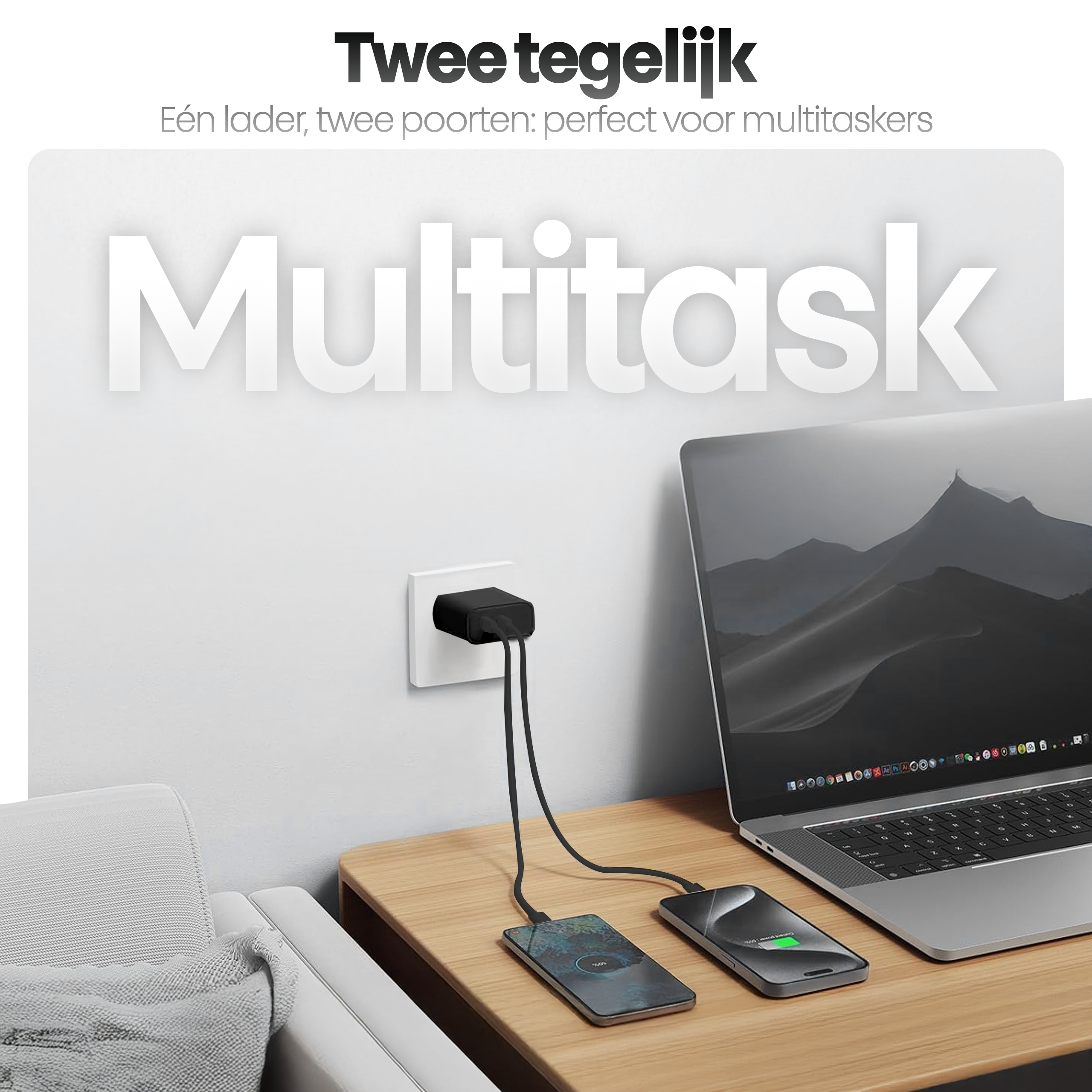 Een oplader met twee kabels die een telefoon en een laptop oplaadt op een houten oppervlak.