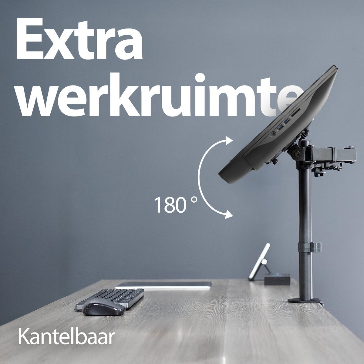 A computer monitor is mounted on a stand, showing a 180-degree rotation. The desk has a keyboard and a mouse.