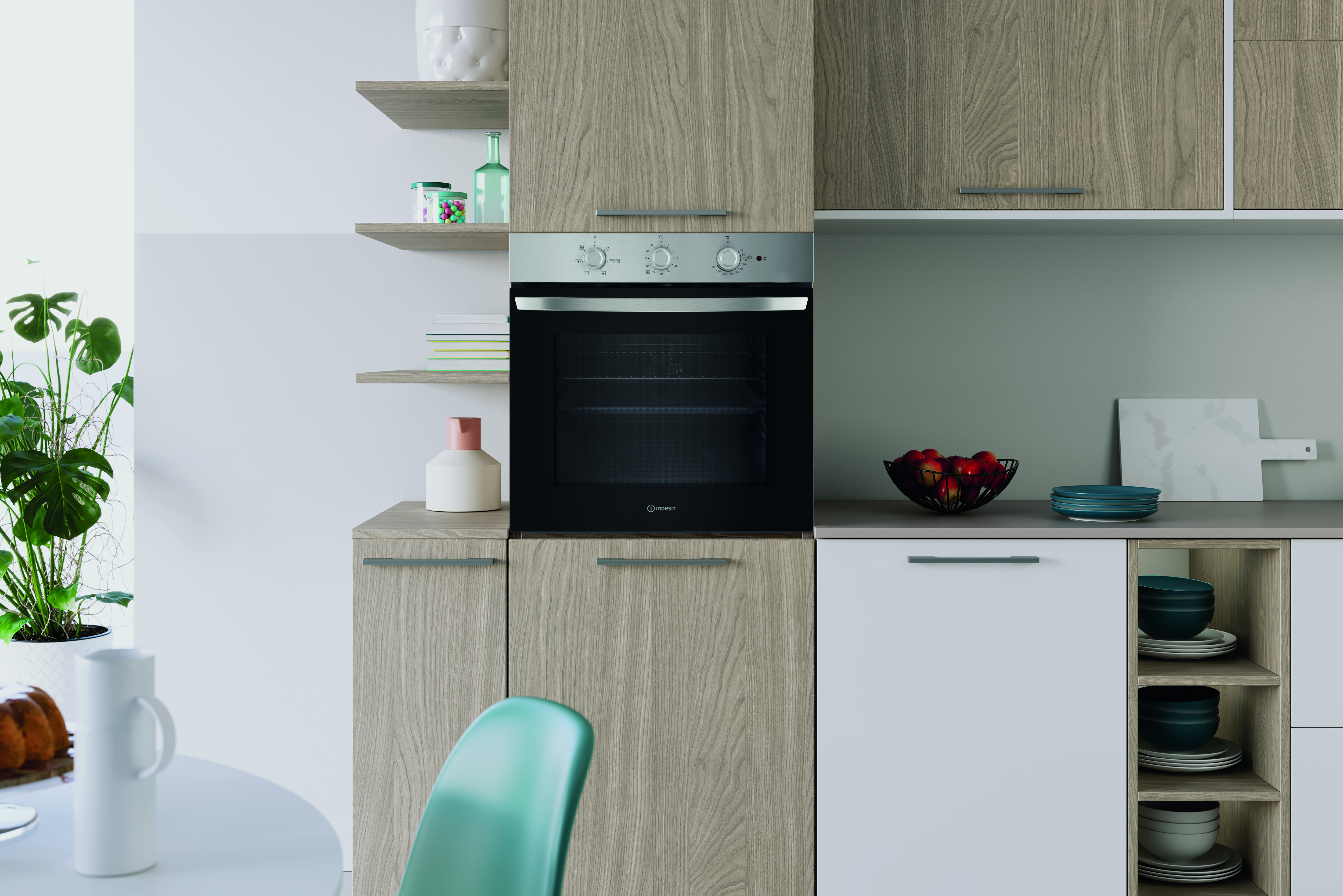 Scena di cucina con forno, mobili in legno e mensole. Include fruttiera, piatti e una sedia.