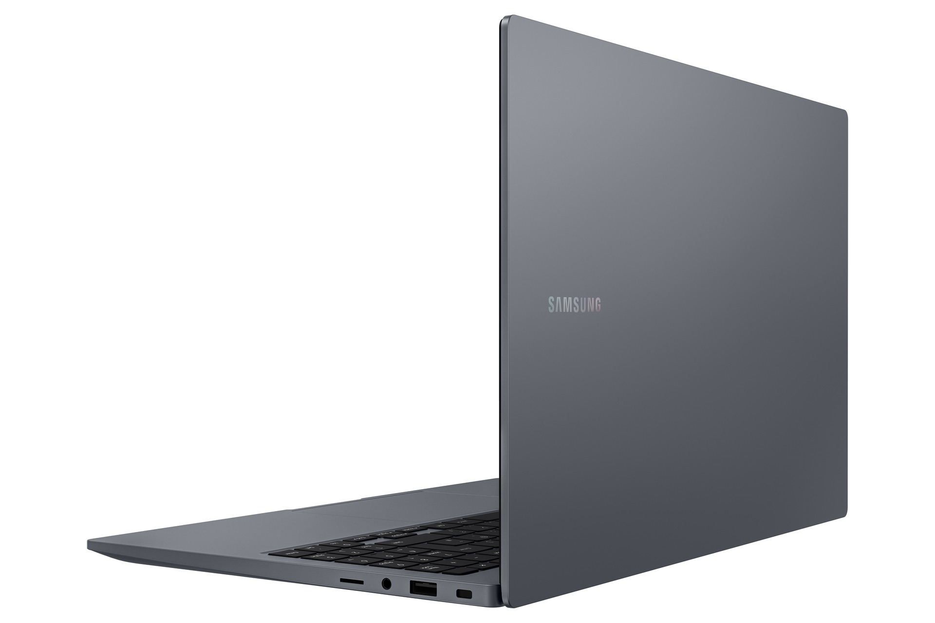Szary laptop Samsung jest lekko otwarty. Widoczna jest klawiatura, a logo Samsunga znajduje się z tyłu.