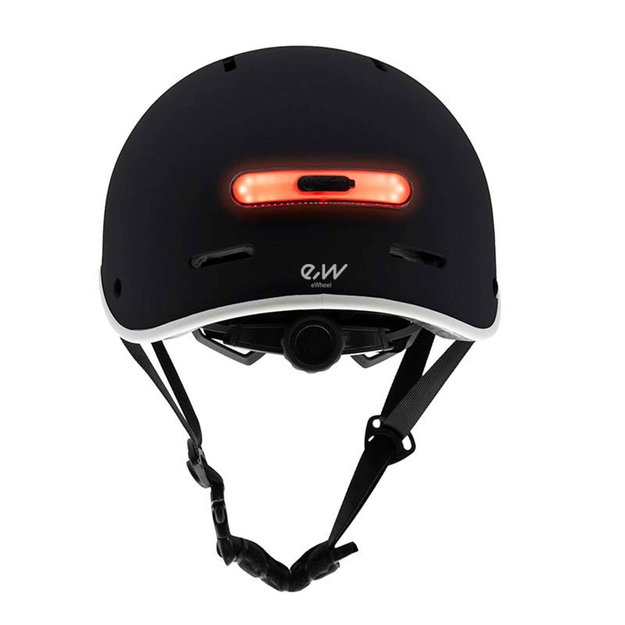 Casco eWheel negro con ribete blanco. Tiene una luz roja en la parte trasera y correas negras con hebilla.