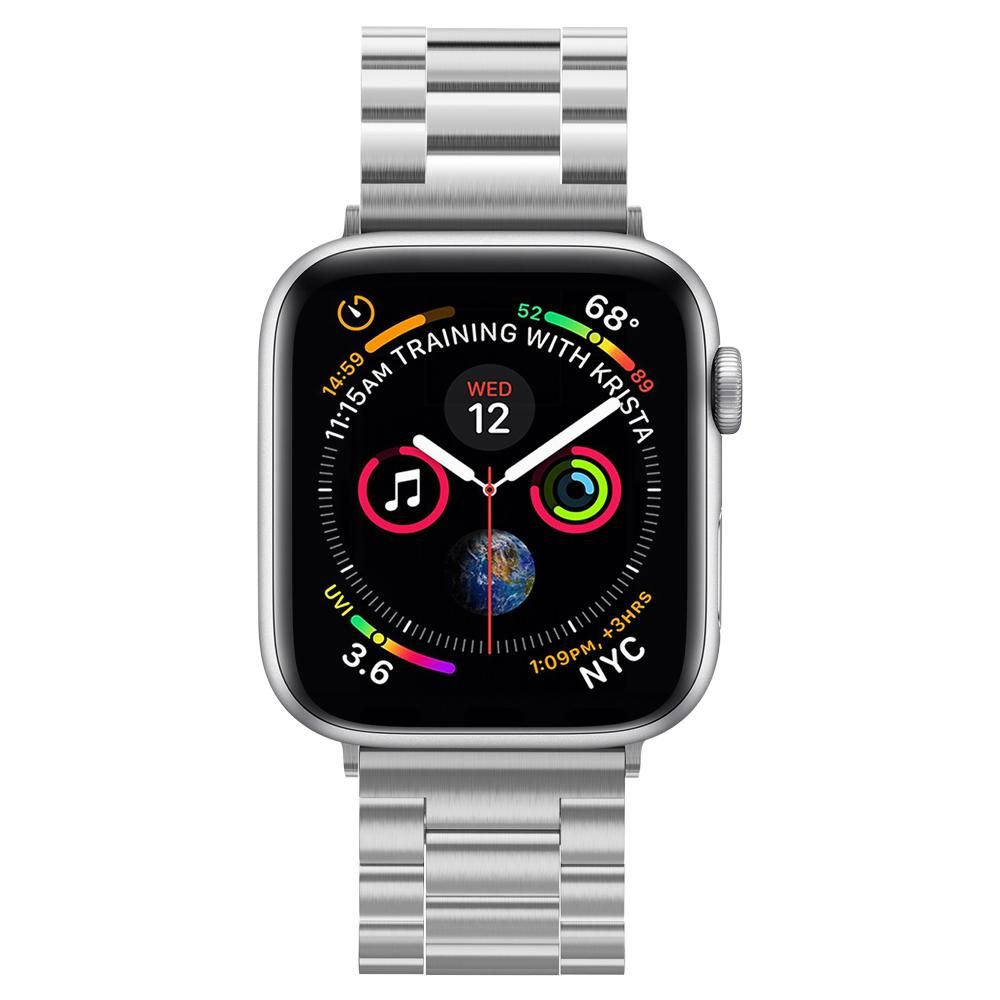 Un Apple Watch argentato mostra l'ora, la data e i parametri sanitari. Anche il cinturino è argentato. Lo schermo mostra i dati di allenamento e l'ora.