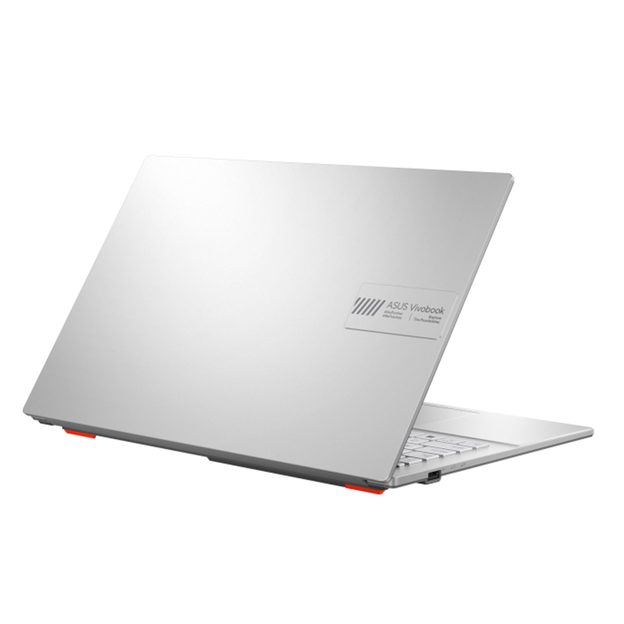 Gümüş bir dizüstü bilgisayar hafifçe açık, klavyeyi gösteriyor. ASUS Vivobook logosu kapakta.