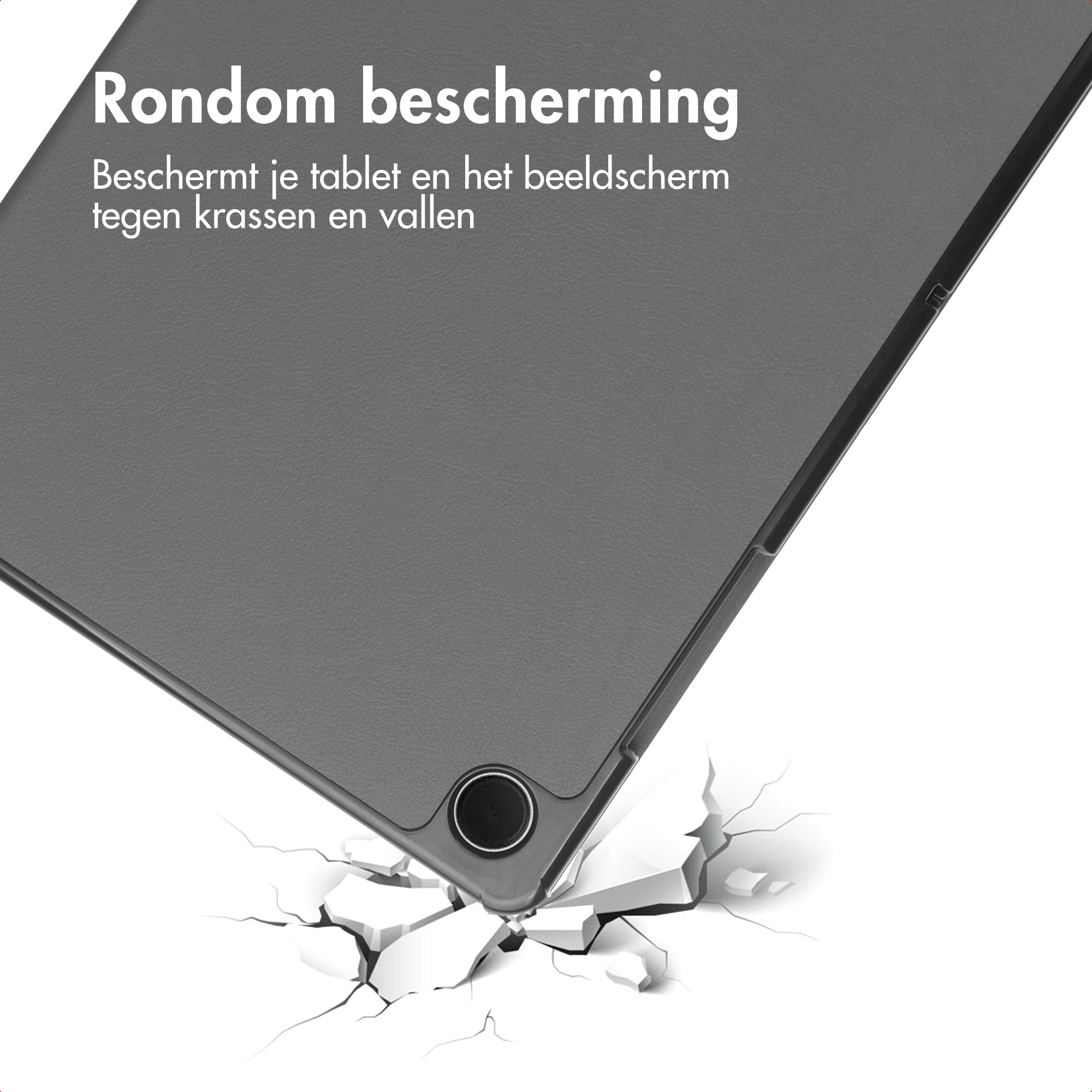 Une coque grise pour tablette protège l'appareil. La coque est sur une surface blanche fissurée.