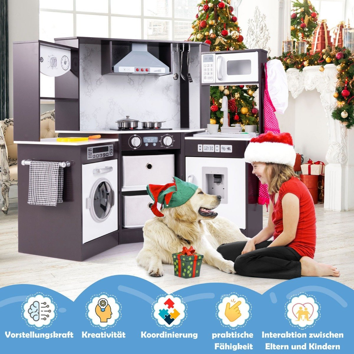 Una niña y un perro con sombreros de elfo y Santa se sientan frente a una cocina de juguete. Árboles de Navidad y una chimenea decoran el fondo.