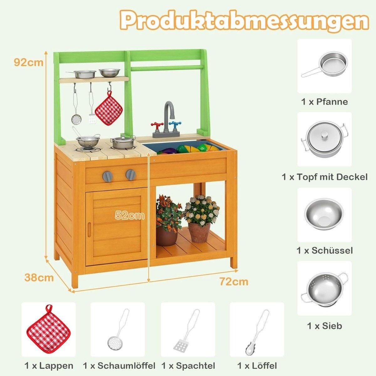 Cocina de juguete de madera con accesorios, dimensiones etiquetadas. Incluye ollas, sartenes, utensilios y plantas. Trapo a cuadros rojo y blanco.