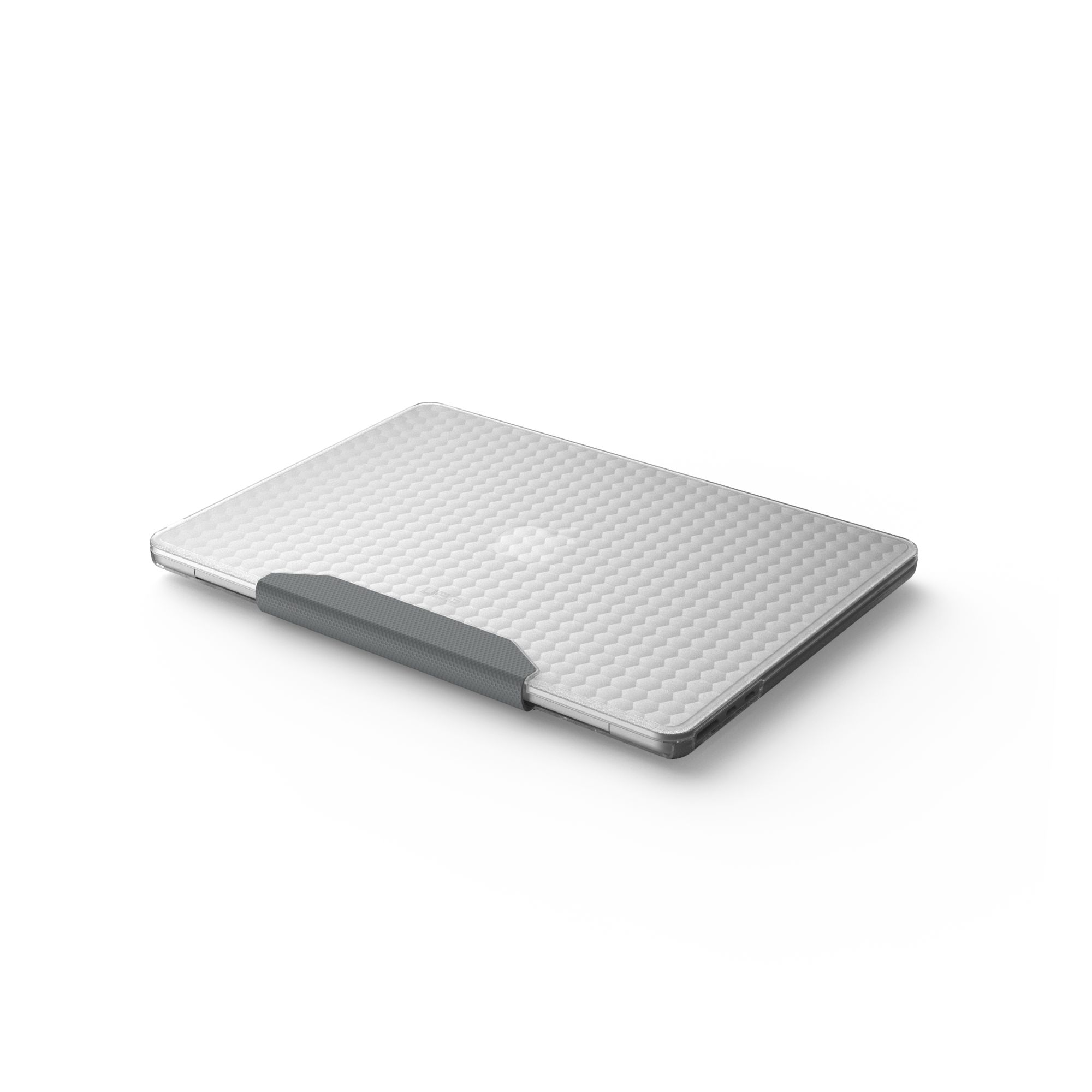 Ein geschlossener silberner Laptop mit grauer Hülle liegt auf weißem Untergrund. Der Laptop hat ein Wabenmuster.