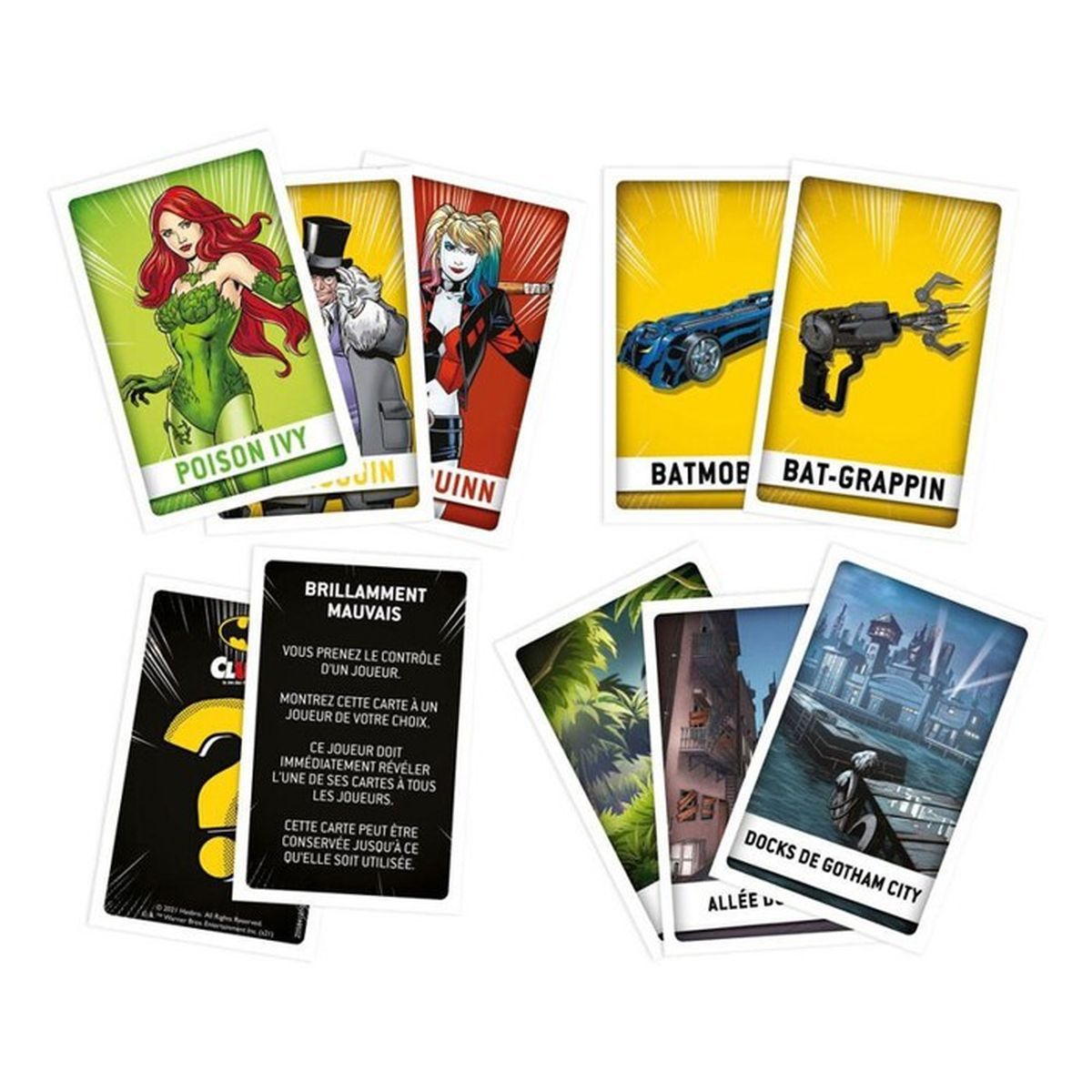 Karten aus einem Brettspiel werden gezeigt. Sie zeigen Charaktere wie Poison Ivy und Harley Quinn sowie Spielelemente.