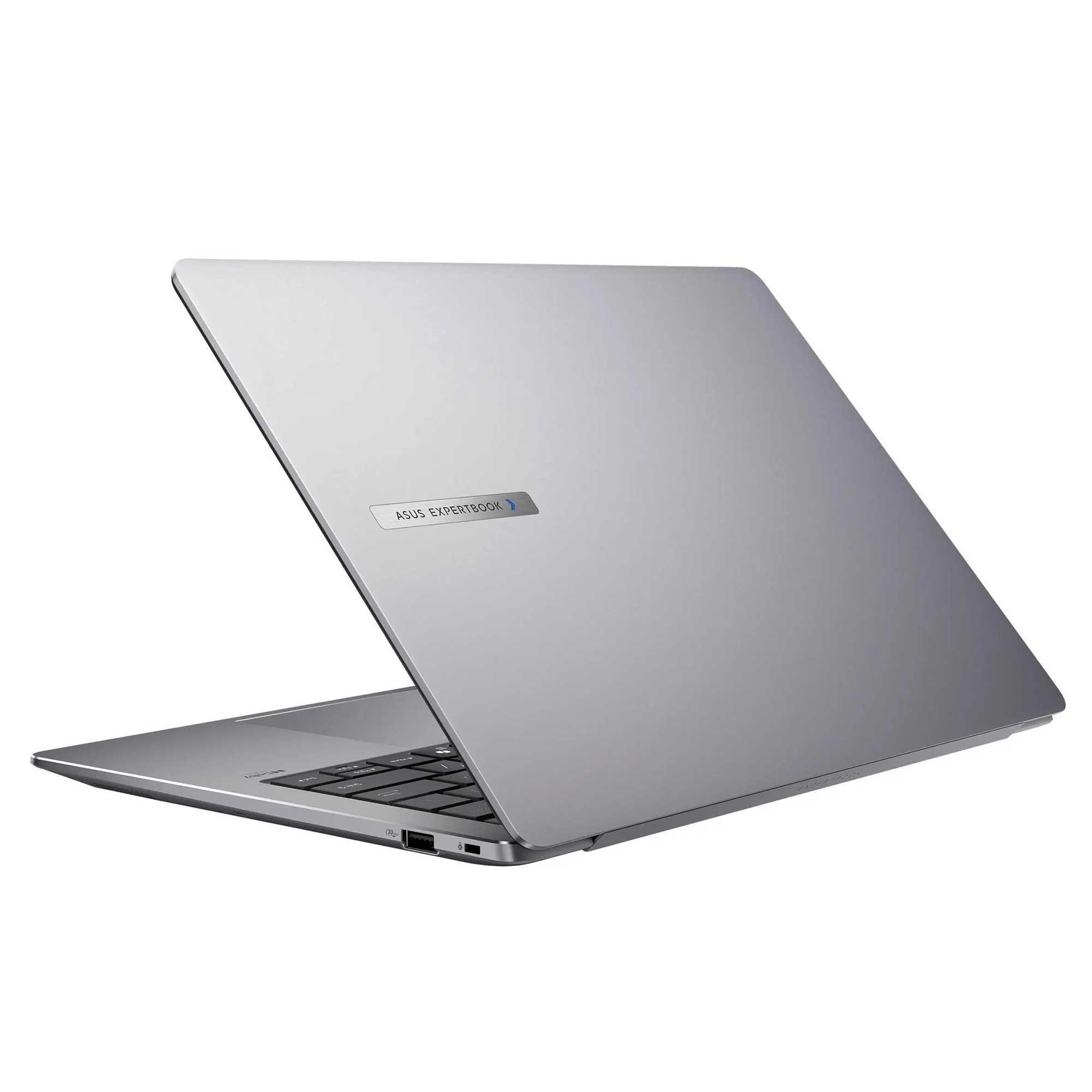 Gümüş bir dizüstü bilgisayar hafifçe açık, klavye gösteriyor. Ekran ASUS EXPERTBOOK logosunu gösteriyor. Beyaz zemin.