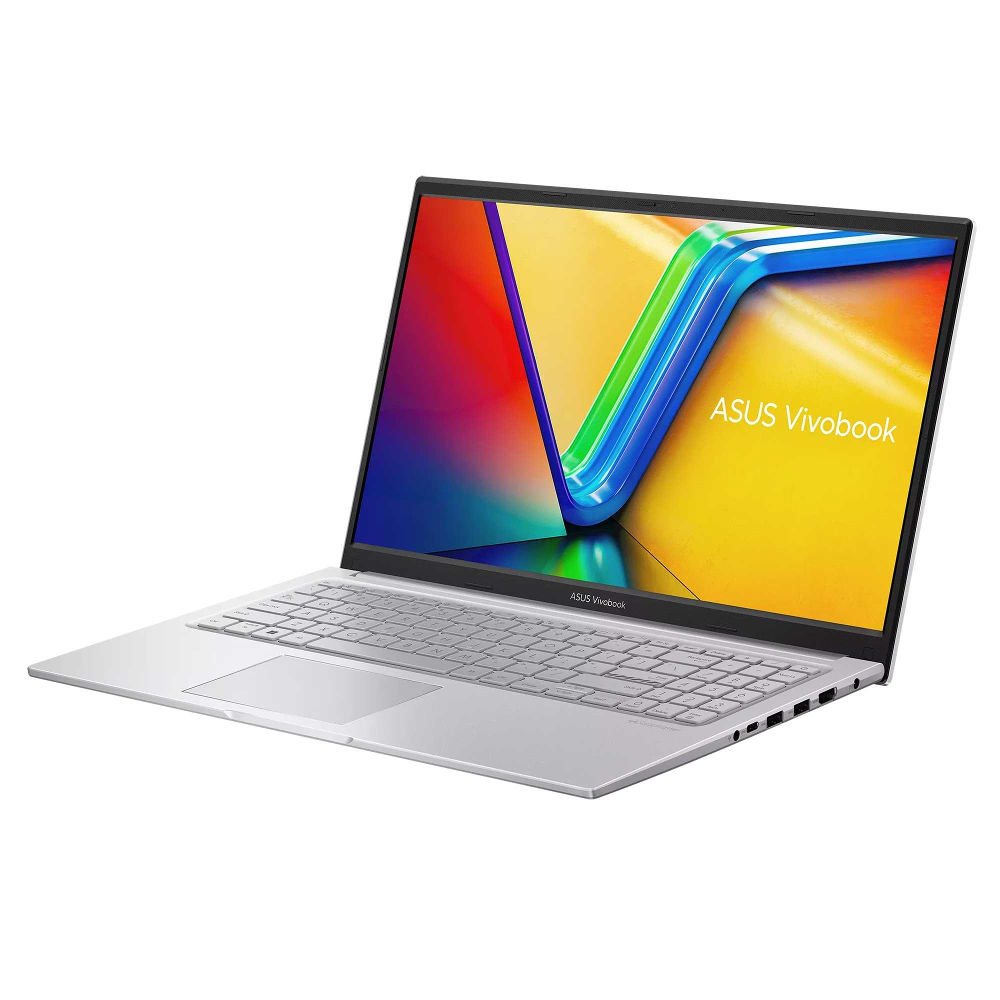 Gümüş renkli ASUS Vivobook dizüstü bilgisayar beyaz bir yüzeyde açık. Ekran renkli bir görüntü gösteriyor. Klavye görülebilir.