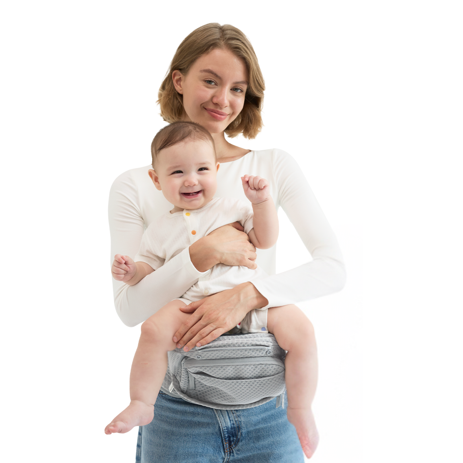 A woman holds a smiling baby. Both are on a white background. The baby is in a carrier, and the woman wears a white shirt.