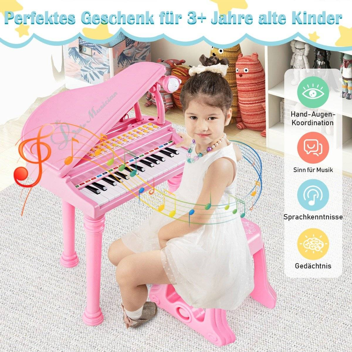 Una niña está sentada frente a un piano de juguete rosa. El piano tiene teclas blancas y negras, y hay notas musicales dibujadas.