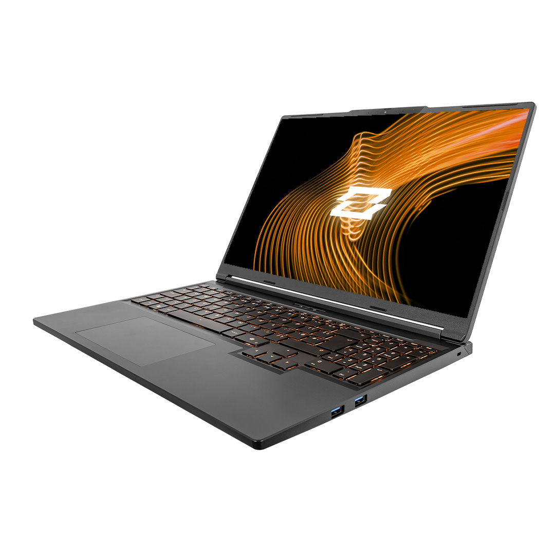 Un laptop grigio scuro è aperto, mostrando una grafica arancione e bianca sullo schermo. La tastiera è illuminata da luci arancioni.