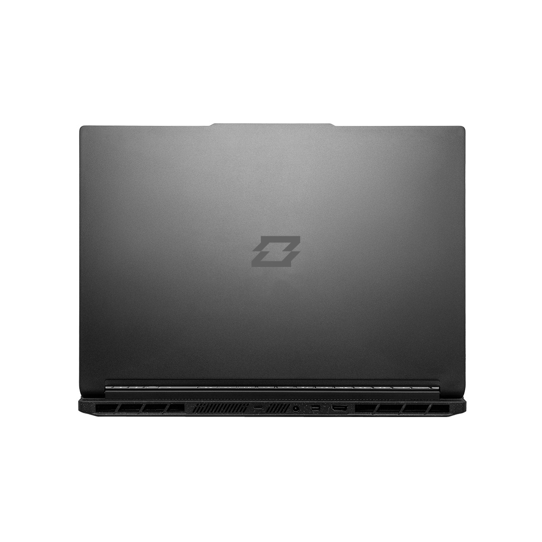 Un laptop chiuso, grigio scuro. Il retro mostra un logo di una 'Z' stilizzata. Il bordo inferiore ha delle porte.