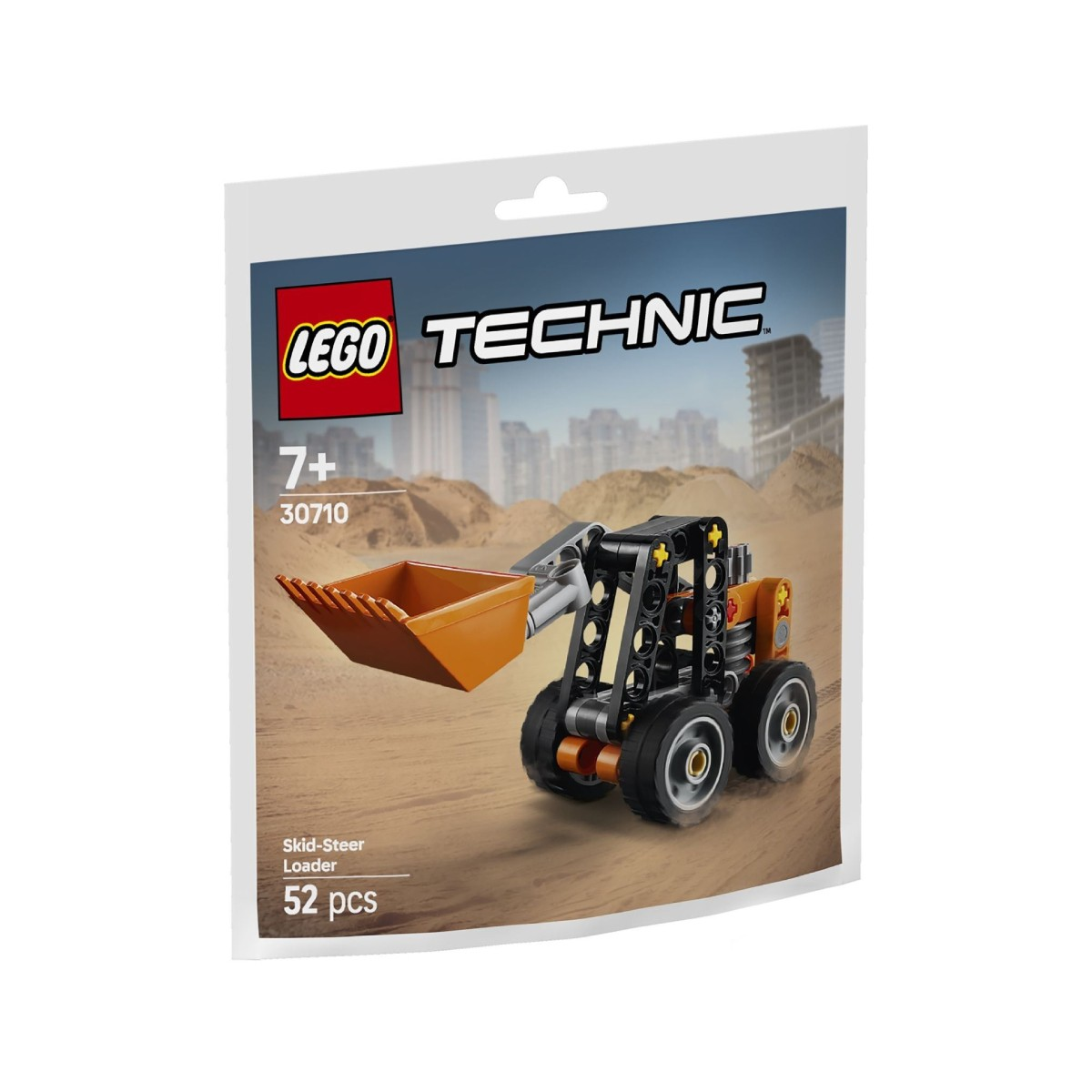 Zestaw LEGO Technic Skid-Steer Loader w opakowaniu. Jest pomarańczowy i czarny. Tło przedstawia pustynię z budynkami.