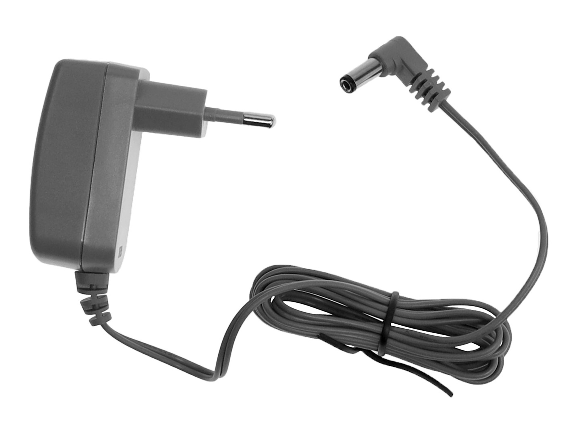 Ein grauer Netzadapter und sein Kabel. Das Kabel ist aufgerollt, der Stecker befindet sich rechts.