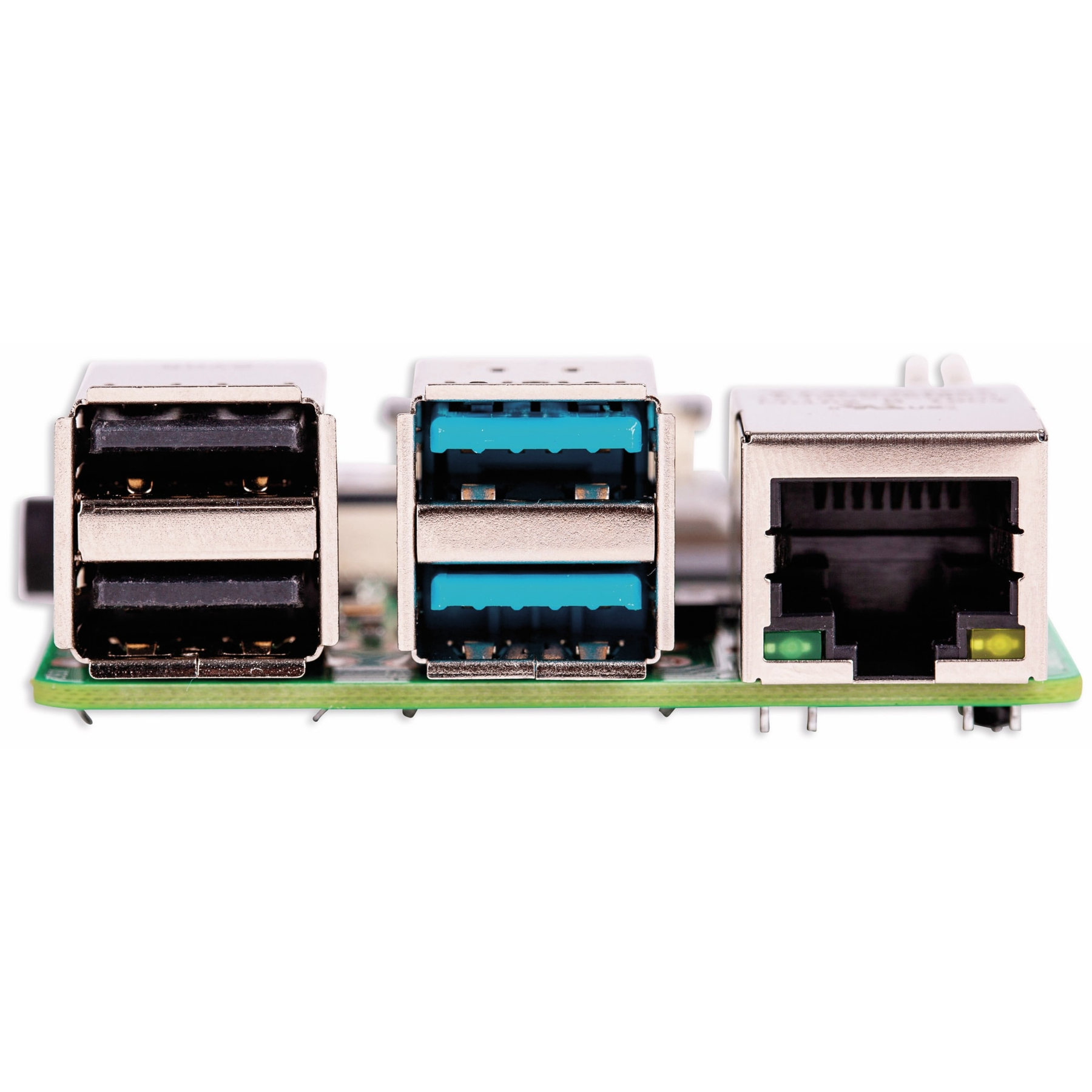 Primer plano de una Raspberry Pi con puertos USB, puerto Ethernet y PCB verde. Los puertos son plateados.