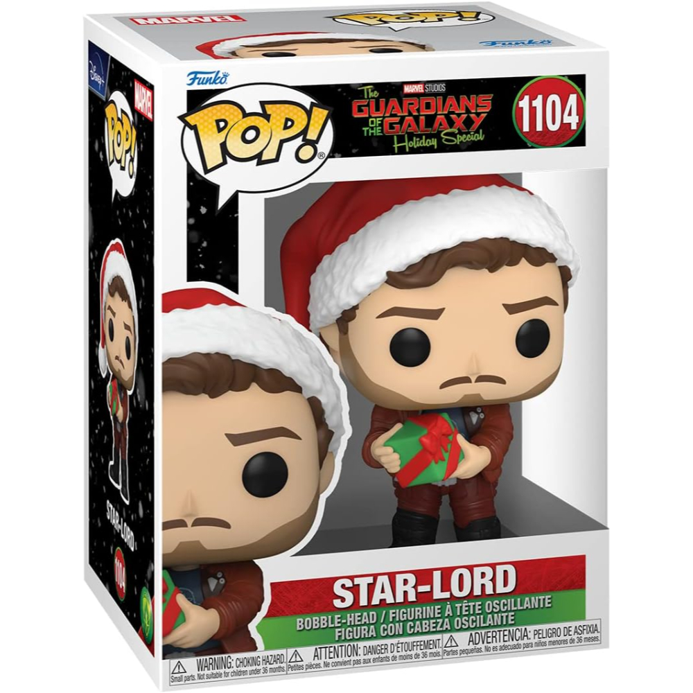 Una scatola Funko Pop con la figura di Star-Lord con cappello da Babbo Natale, che tiene un regalo. La scatola è bianca con il marchio Marvel e Funko.