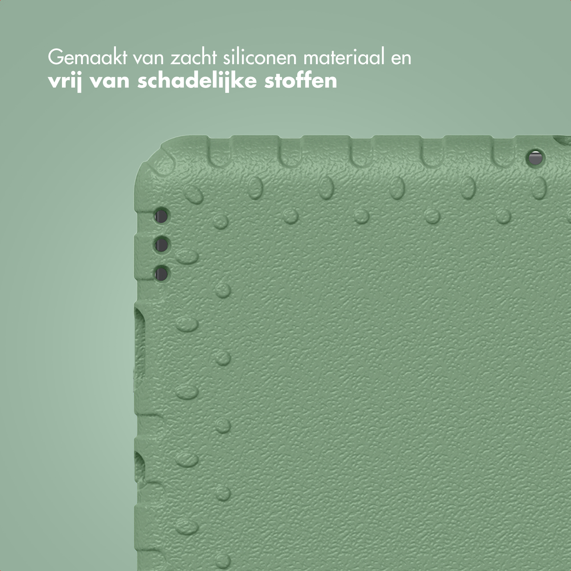 Close-up van een getextureerd groen oppervlak met een gebogen rand en een paar kleine gaatjes. De achtergrond is lichtgroen.